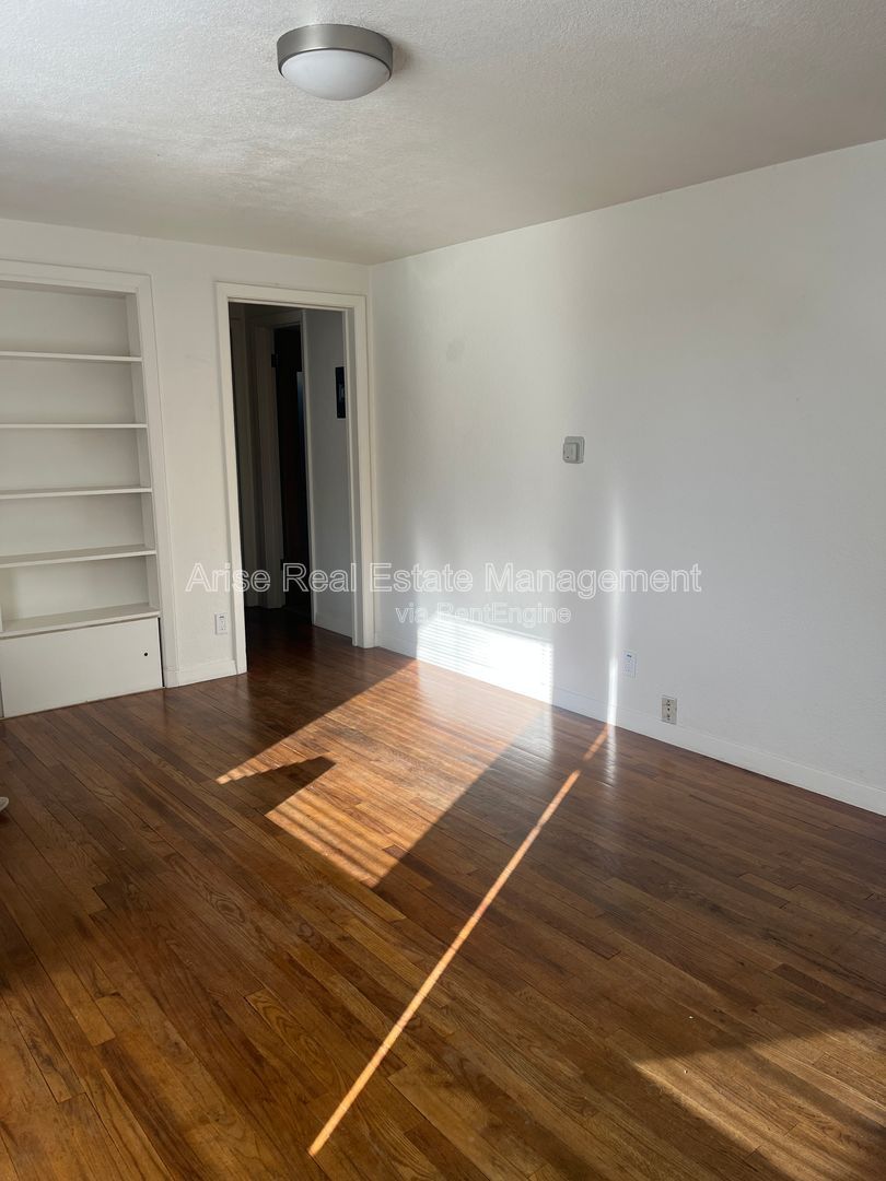 Charming one-bedroom home featuring vintage charm, cozy living spaces, and classic character throughout. property image