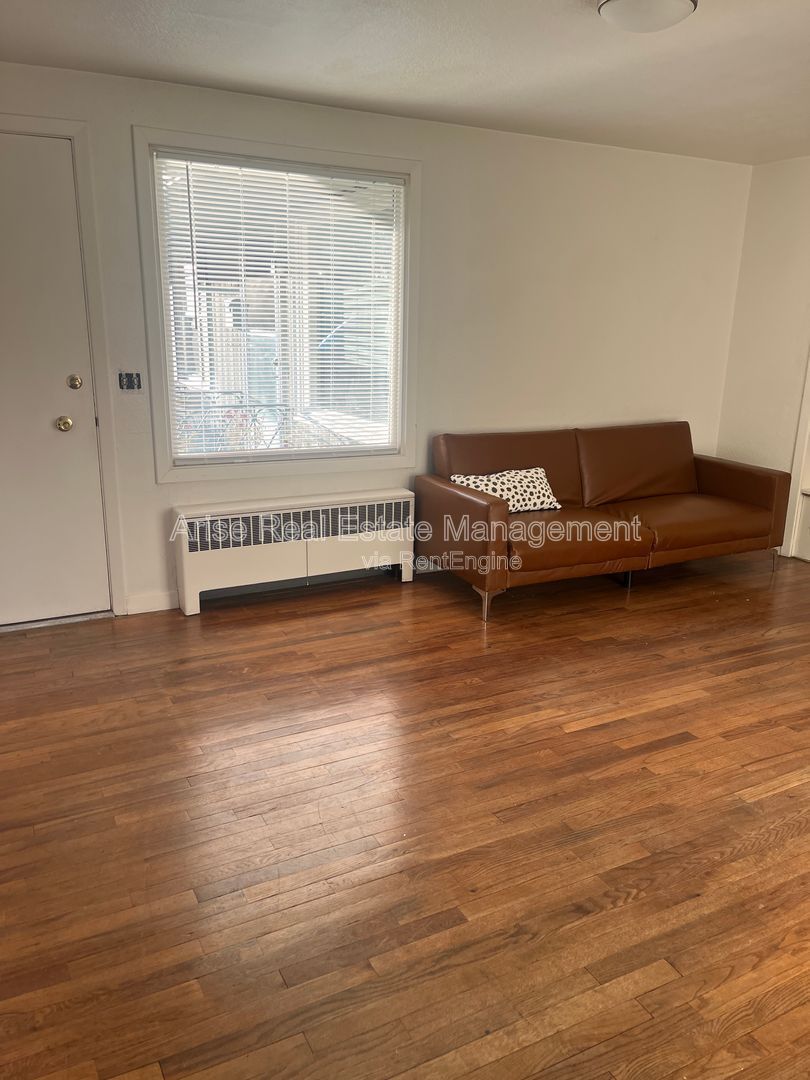 Charming one-bedroom home featuring vintage charm, cozy living spaces, and classic character throughout. property image