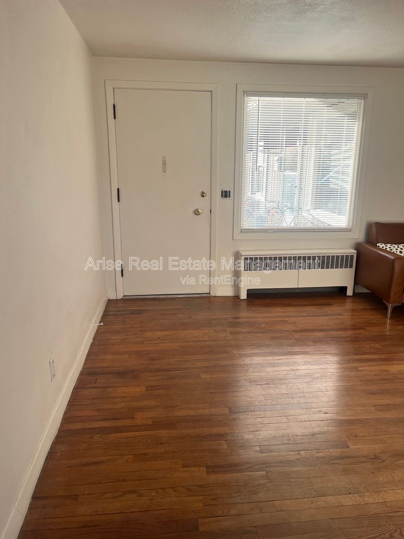 Charming one-bedroom home featuring vintage charm, cozy living spaces, and classic character throughout. property image