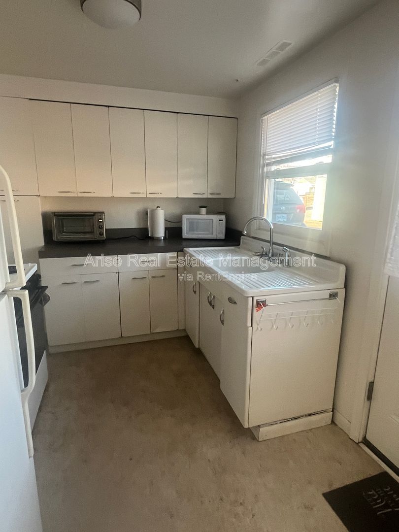 Charming one-bedroom home featuring vintage charm, cozy living spaces, and classic character throughout. property image