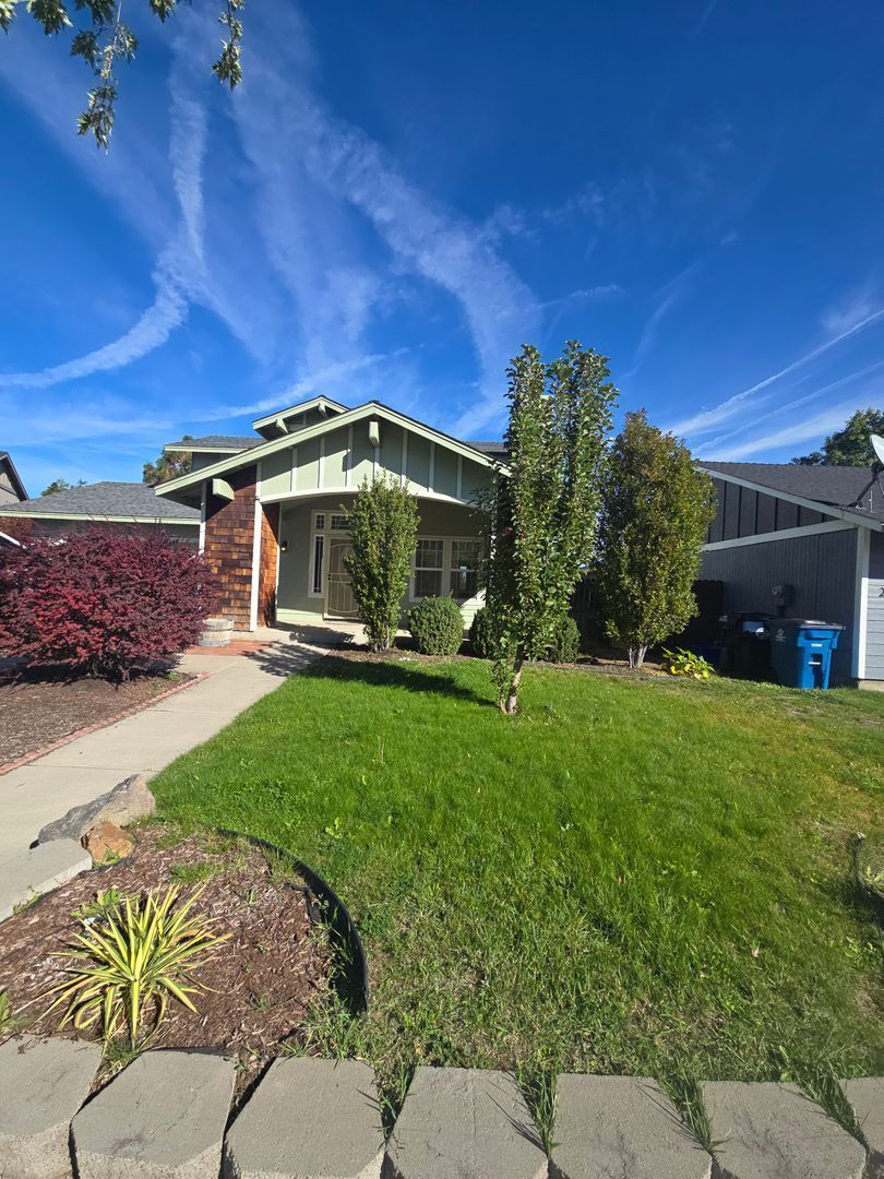 Charming Home with Gas Fireplace, Large Yard, Shed & Raised Garden Beds – Close to Parks property image