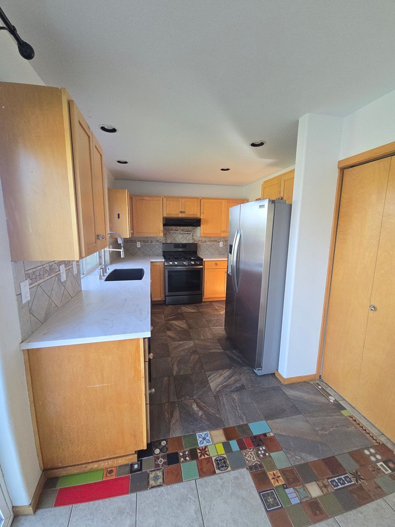 Charming Home with Gas Fireplace, Large Yard, Shed & Raised Garden Beds – Close to Parks property image