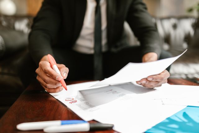 person working with financial documents