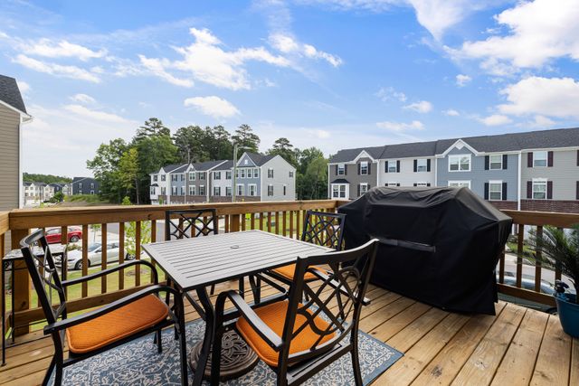 wooden deck with furniture